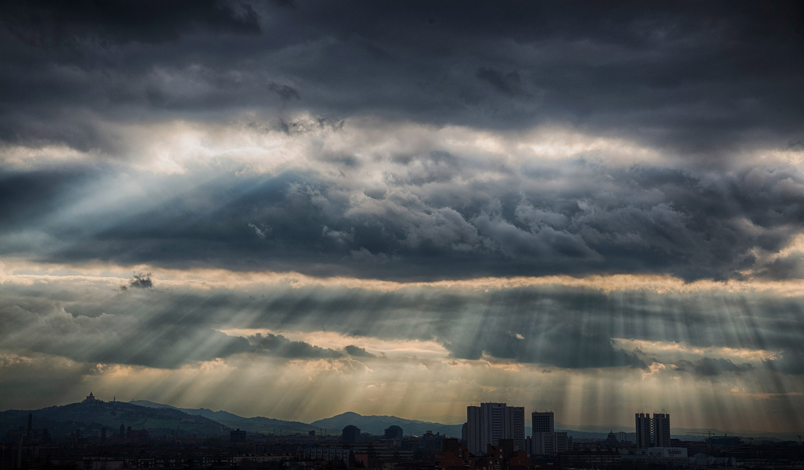 Rays of Hope Over Bologna, Italy