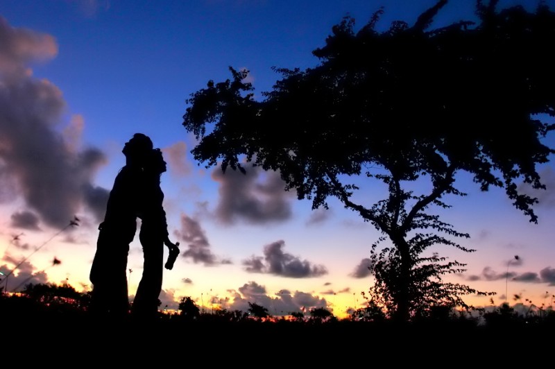 Silhouette of a Couple Standing Together
